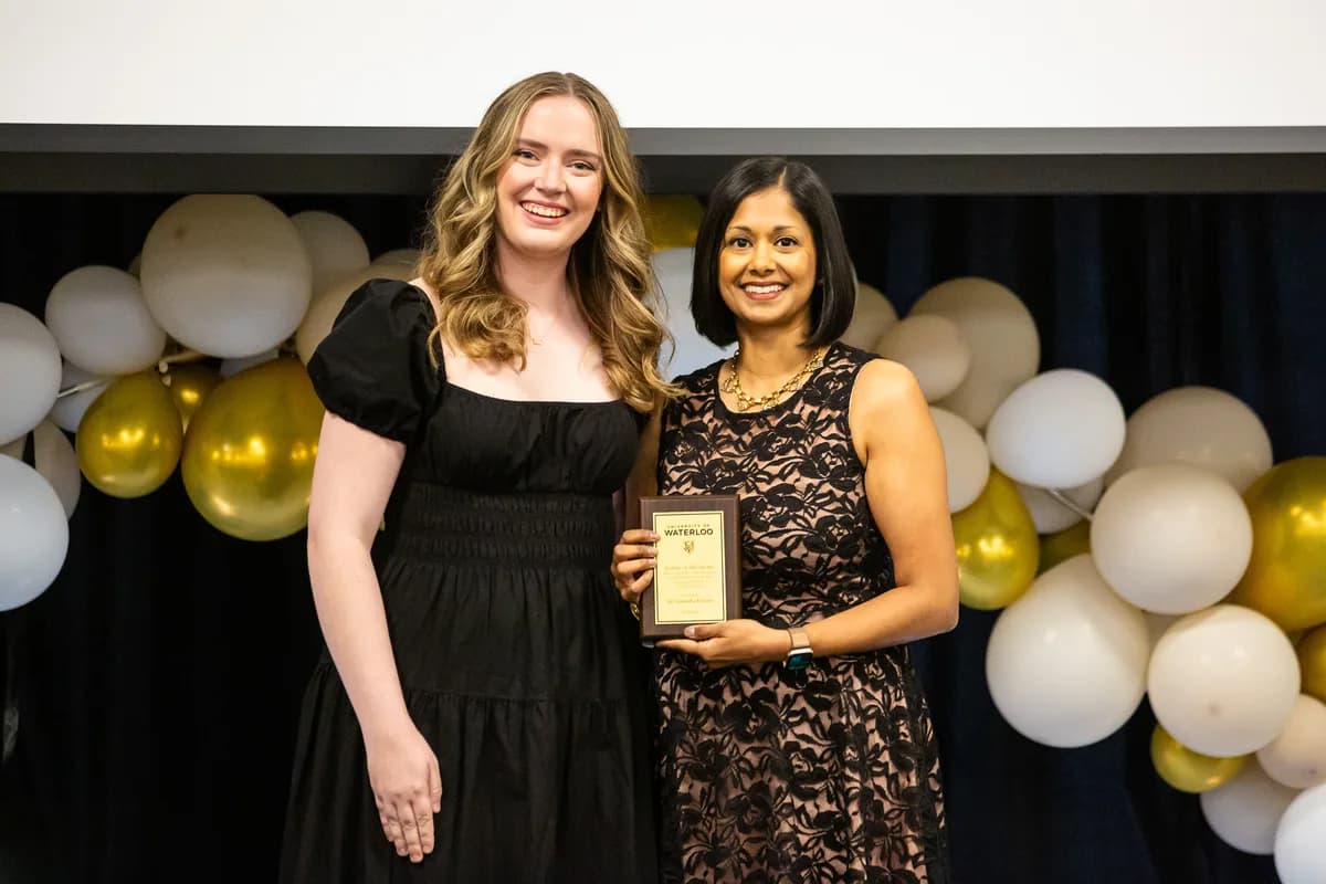 Dr. Jasmintha Ellaurie receiving the 2025 Distinguished Teaching Assistant Award